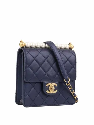 Chanel Navy Iridescent Flap Bag with Pearls.