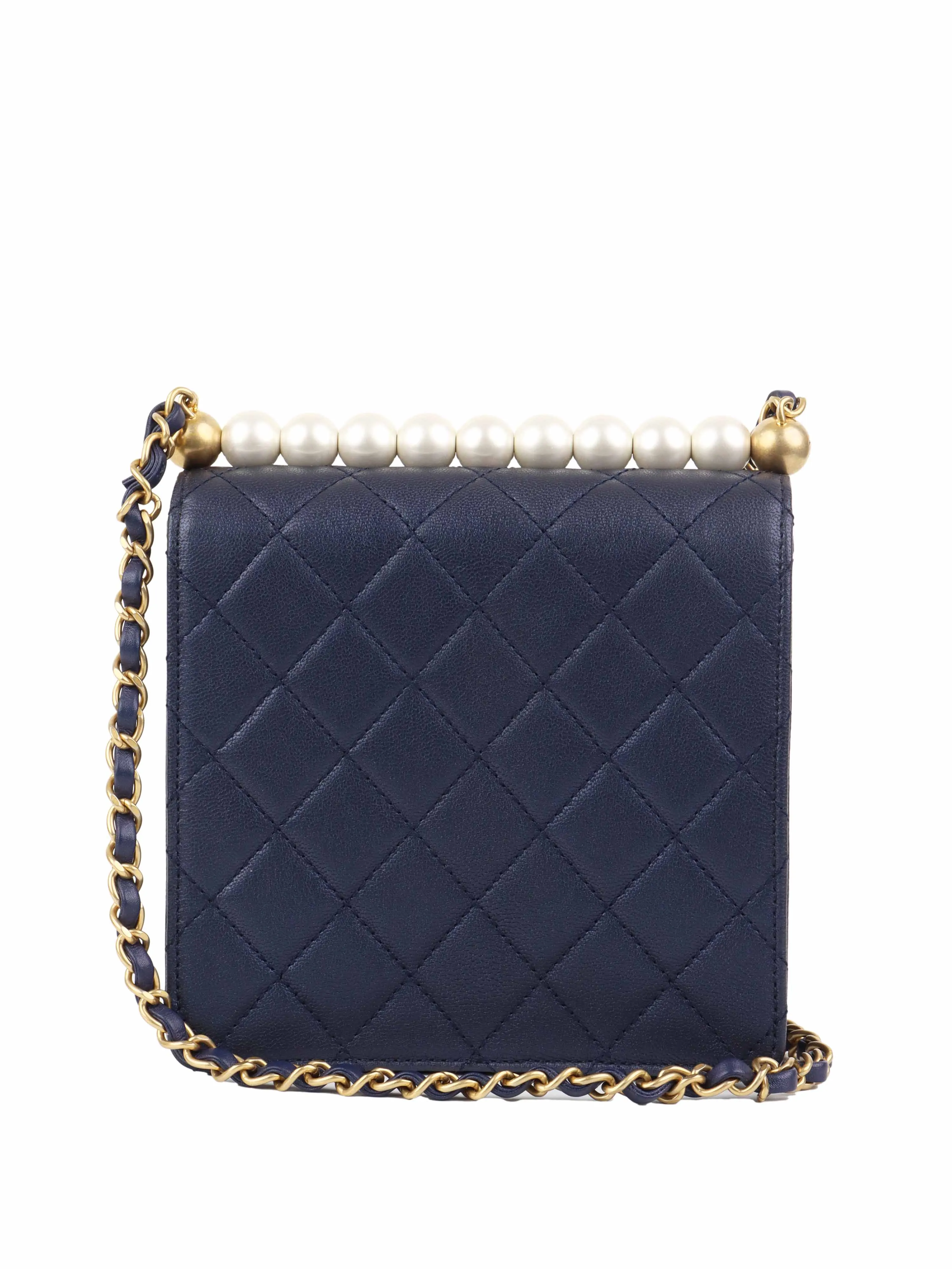 Chanel Navy Iridescent Flap Bag with Pearls.