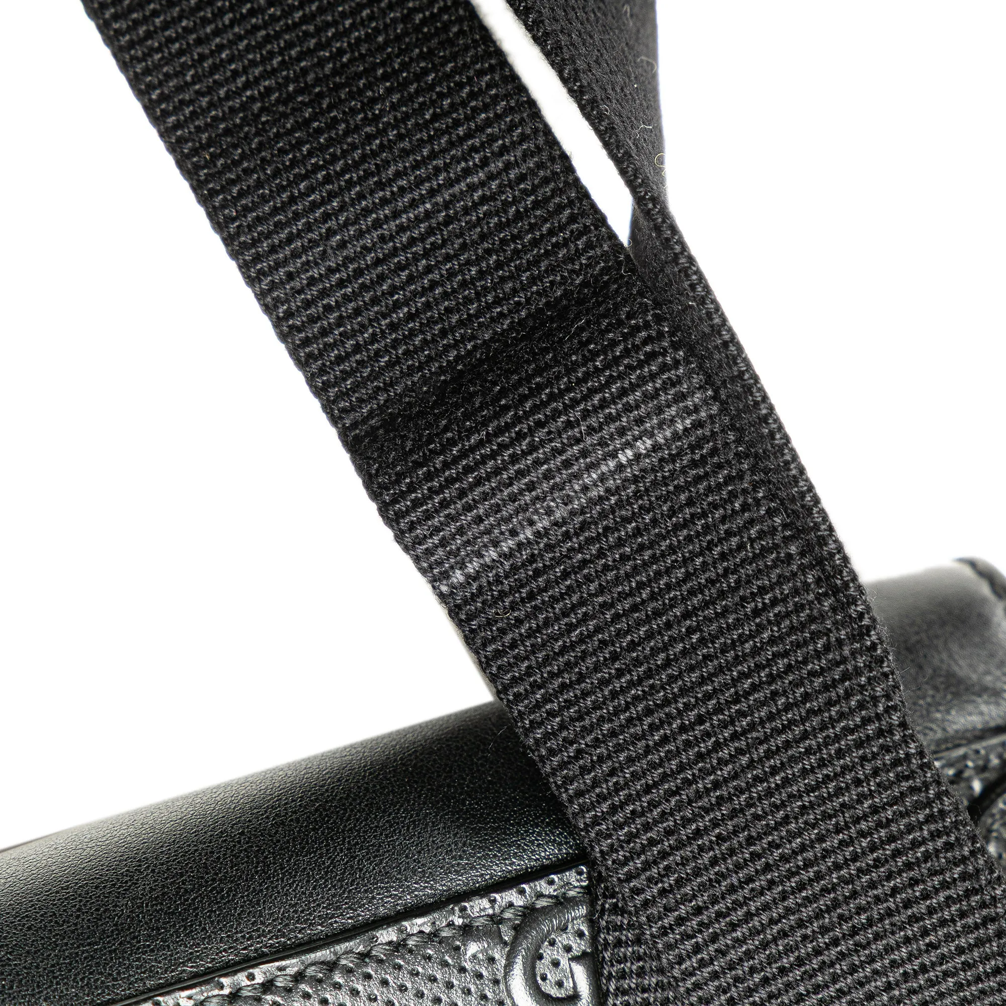 GG Embossed Perforated Double Belt Bag